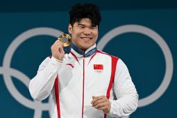 Liu Huanhua antar China kembali tambang emas dari angkat besi