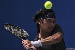 Petenis Christo belum mau gantung raket