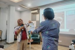 Bagaimana kaum perempuan kelola sampah untuk atasi dampak bencana