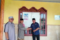 IWO Lampung Timur wakaf Al Quran  di Masjid Al-Barokah Desa Sidorejo