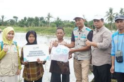 PLN South-Central Kalimantan aids flood victims