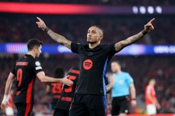 Sepuluh pemain Barcelona bungkam Benfica di kandangnya