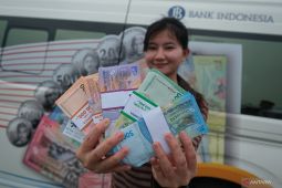 Pelemahan kurs rupiah didorong rating Fitch