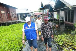 Pastikan dampak banjir, Bupati HSU kunjungi Desa Danau Terate