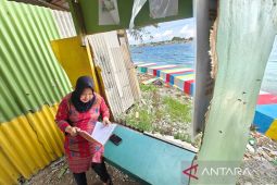 Pulau Kelapa yang warganya berjuang melawan sampah