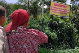 Ancaman kerusakan alam, TNI pasang spanduk larangan PETI di Aek Natas