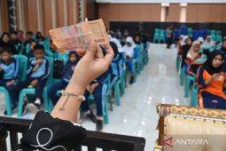 Nilai tukar Rupiah menguat seiring sikap pasar berubah terkait suku bunga Fed