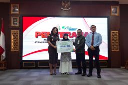 Kejari Tangsel serahkan santunan JKM- JHT Bpjamsostek Rp47 juta