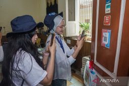 Generasi QRIS di era cashless society