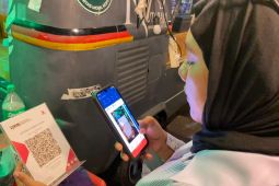 Generasi QRIS di era cashless society