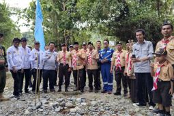 DSLNG dan pramuka kwarran kintom tanam 500 bibit pohon di Babang Buyangge