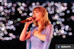 Graham Norton&nbsp;puji kepiawaian Taylor Swift&nbsp;sutradarai video Opalite
