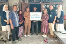 BPJS Ketenagakerjaan Cikarang santuni ahli waris almarhum Anom Bin Ilan penjual kopi