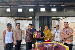 Pemkab Merangin serahkan bantuan kepada korban kebakaran bengkel