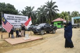 Wisata patok perbatasan Indonesia-Malaysia