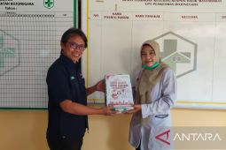 Tekan ispa di Serang, LKBN ANTARA bagikan masker gratis