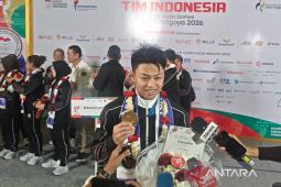 Lifter Rahmat Erwin mempersembahkan emas Asian Games bagi keluarga