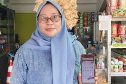 OCTO Mobile jadi sahabat setia Merry di setiap transaksi
