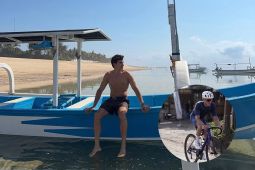 Gowes di jalanan berkelok hingga jalan santai di pantai jadi liburan Marc Marquez di Indonesia