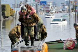 Japan disaster death-missing toll passes 11,000: police