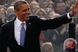 Obama says sorry to Karzai for civilian deaths