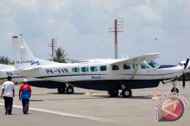 Plane crash pilot`s bodies to be brought to Jakarta