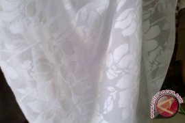 Sutra Singapura Banjiri Pasar Tekstil