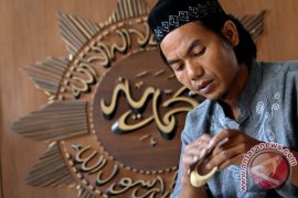 Kaligrafi bambu runcing