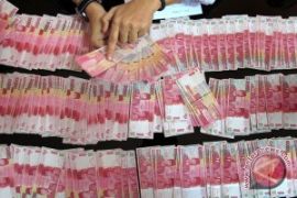 Rupiah Menguat 15 Poin