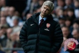 Wenger sangat sedih Atletico hancurkan mimpi indahnya