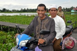 HARUS NAIK MOTOR