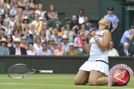  Bartoli Raih Gelar Juara Wimbledon