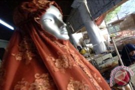 Gamis Berpayet Dengan Rajutan Jadi Pilihan