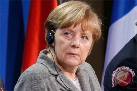  Merkel Desak Putin "Tekan" Separatis Ukraina Pro-Rusia