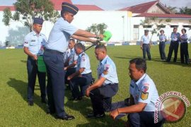 TRADISI KENAIKAN PANGKAT