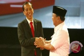 Prabowo Salutes at President Joko Widodo