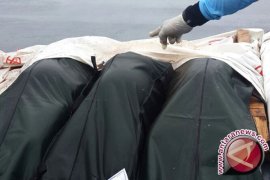 Three AirAsia Victims Flown to Surabaya