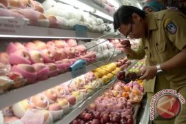 HIMBAUAN BUAH APEL IMPOR BERBAHAYA