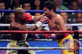 Mayweather Sebut Pacquiao Sebagai "Petarung Luar Biasa" 