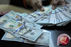 Dolar AS Melemah Tertekan Laporan