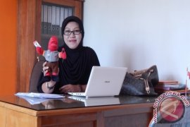 Arwana, Maskot KPU Kabupaten Kapuas Hulu 