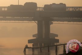 Tertutup kabut asap Page 1 Small