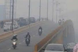 Kabut Asap Tebal Selimuti Kota Pekanbaru