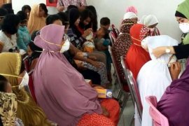 IAGI Riau Bagikan 2.600 Masker N95 Di Kelurahan Meranti Pandak