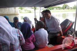 Uji Coba Naik Perahu