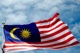 Malaysia tangguhkan penerimaan pekerja asing karena protes Page 1 Small