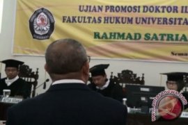 Putra Wajok Sidang Doktoral di Undip