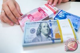 Tertekan Data Ekonomi Suram, Dolar AS Melemah 