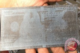 Polisi Tangkap Pengedar Uang Palsu Jaringan Internasional