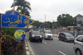 Gambar Firdaus di Bawah Asmaul Husna Jalan Sudirman Sudah Dicopot